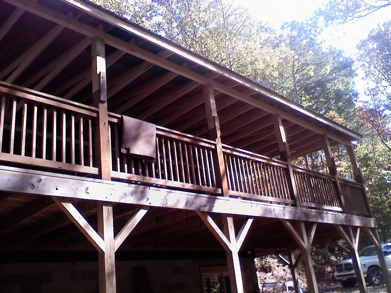 Timber framing under a new elevated porch and deck — Roof Leak Repair in Saunderstown by Roofing Brothers